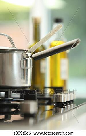 Saucepan on stove View Large Photo Image Stock Photography - Saucepan on stove. Fotosearch