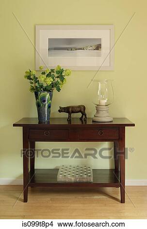 Sideboard with ornaments and vase View Large Photo Image Picture - Sideboard with ornaments and vase. Fotosearch