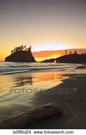 Sunset through rock arch, Second Beach near La Push, Olympic National Park, Washington, USA View Large Photo Image Picture - Sunset through rock arch, Second Beach near La Push, Olympic National Park, Washington, USA. Fotosearch
