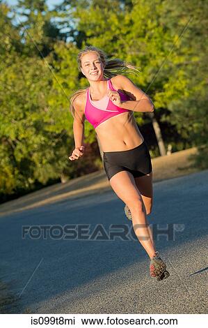 Teenage girl running View Large Photo Image Stock Image - Teenage girl running. Fotosearch