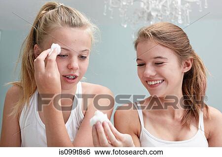 Teenage girls cleansing View Large Photo Image Stock Photograph - Teenage girls cleansing. Fotosearch