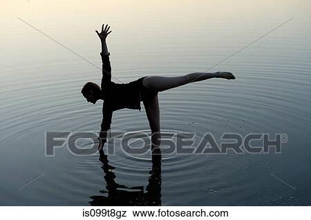 Woman in yoga pose in lake View Large Photo Image Stock Photo - Woman in yoga pose in lake. Fotosearch