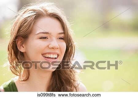 Stock Photograph - Young woman smiling. Fotosearch