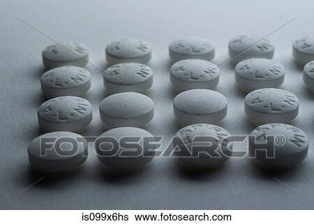 Aspirins in a row View Large Photo Image Stock Photograph - Aspirins in a row. Fotosearch