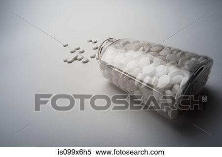 Bottle of aspirin spilling View Large Photo Image Stock Photography - Bottle of aspirin spilling. Fotosearch
