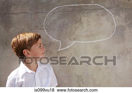 Boy with chalk speech bubble on wall View Large Photo Image Stock Photo - Boy with chalk speech bubble on wall. Fotosearch