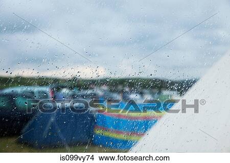 Picture - Camp site in the rain. Fotosearch