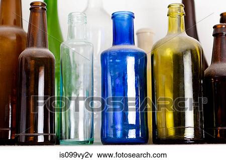 Stock Photo - Colourful glass bottles. Fotosearch