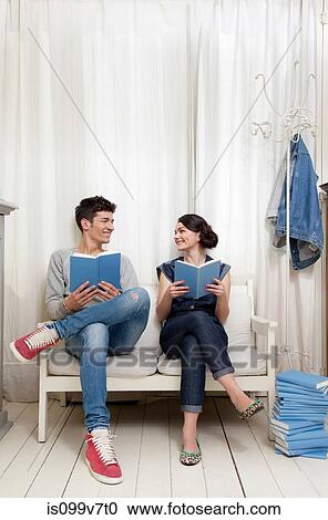 Couple holding books View Large Photo Image Stock Image - Couple holding books. Fotosearch