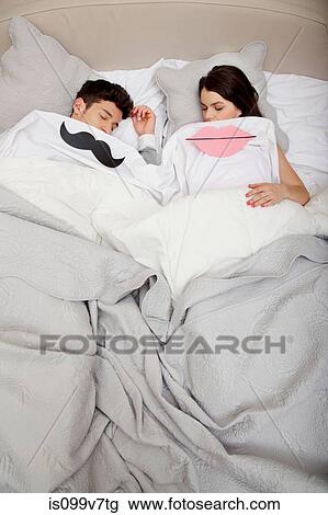 Couple in bed with lips and moustache View Large Photo Image Stock Image - Couple in bed with lips and moustache. Fotosearch