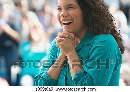 Stock Photo - Excited female spectator. Fotosearch
