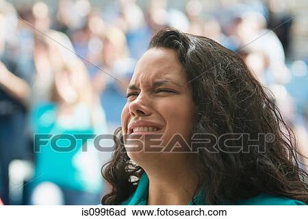 Female spectator looking upset View Large Photo Image Stock Image - Female spectator looking upset. Fotosearch