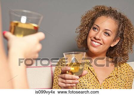 Friends with white wine View Large Photo Image Stock Photo - Friends with white wine. Fotosearch