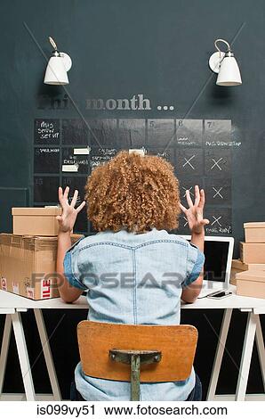 Frustrated woman working from home View Large Photo Image Stock Image - Frustrated woman working from home. Fotosearch