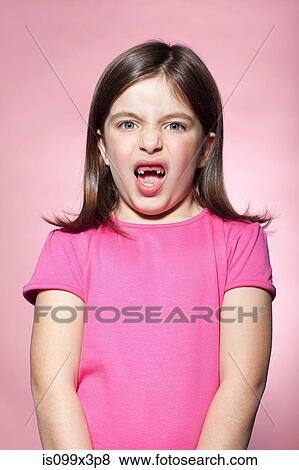 Girl pulling faces View Large Photo Image Stock Photo - Girl pulling faces. Fotosearch