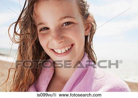 Girl with wet hair, wrapped in towel View Large Photo Image Stock Image - Girl with wet hair, wrapped in towel. Fotosearch