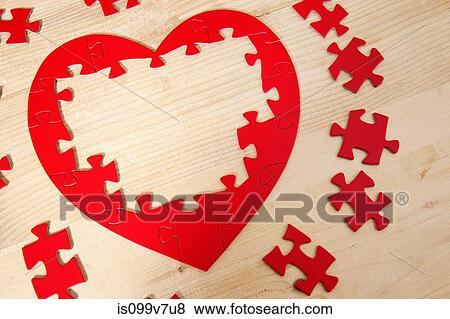 Heart shaped jigsaw puzzle View Large Photo Image Stock Photo - Heart shaped jigsaw puzzle. Fotosearch