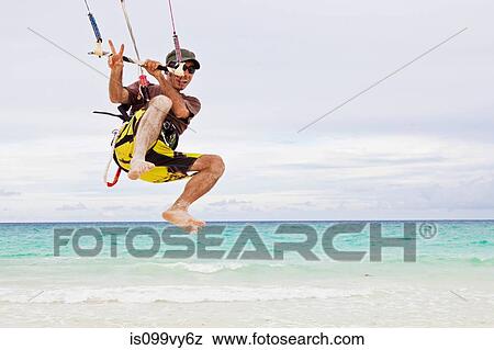 Kitesurfer in the air View Large Photo Image Stock Photo - Kitesurfer in the air. Fotosearch
