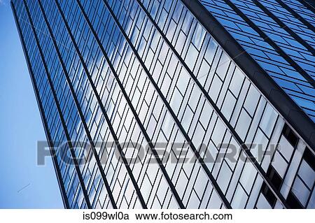 Low angle view of office building View Large Photo Image Stock Image - Low angle view of office building. Fotosearch