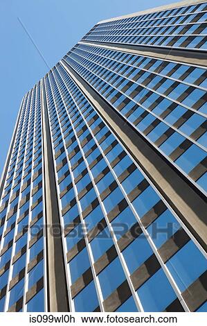 Low angle view of office building View Large Photo Image Stock Image - Low angle view of office building. Fotosearch