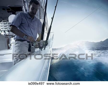 Man fishing from yacht View Large Photo Image Stock Photo - Man fishing from yacht. Fotosearch