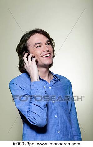 Man on smartphone View Large Photo Image Stock Image - Man on smartphone. Fotosearch