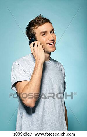 Man on smartphone View Large Photo Image Stock Photo - Man on smartphone. Fotosearch