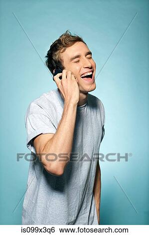 Man on smartphone View Large Photo Image Stock Photograph - Man on smartphone. Fotosearch