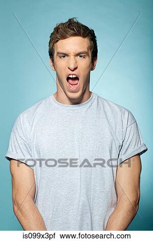 Man pulling faces View Large Photo Image Stock Image - Man pulling faces. Fotosearch