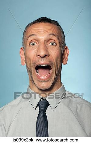 Man shouting with mouth open View Large Photo Image Stock Image - Man shouting with mouth open. Fotosearch