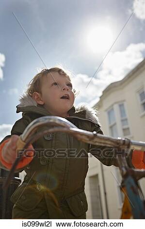 Mod toddler boy on retro bicycle View Large Photo Image Stock Image - Mod toddler boy on retro bicycle. Fotosearch