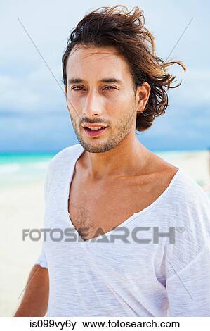 Portrait of a man on beach View Large Photo Image Stock Photo - Portrait of a man on beach. Fotosearch