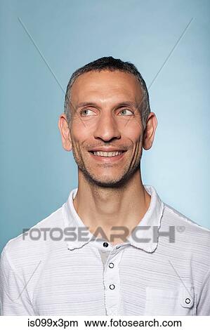 Portrait of man smiling View Large Photo Image Picture - Portrait of man smiling. Fotosearch