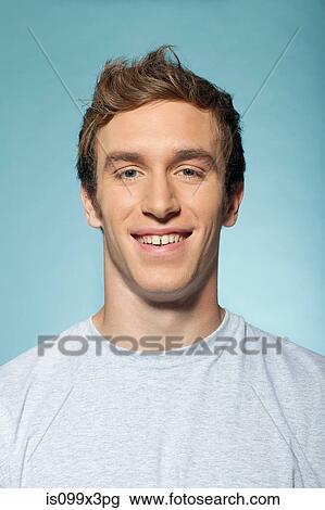 Stock Image - Portrait of man smiling. Fotosearch