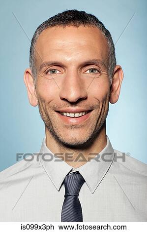 Stock Image - Portrait of man smiling. Fotosearch