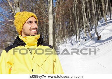 Portrait of man wearing yellow knit hat and coat View Large Photo Image Stock Photo - Portrait of man wearing yellow knit hat and coat. Fotosearch