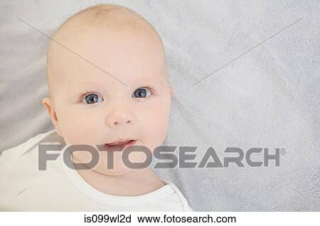 Portrait of newborn baby looking at camera View Large Photo Image Stock Image - Portrait of newborn baby looking at camera. Fotosearch