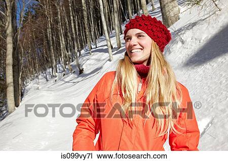 Portrait of woman wearing red knit hat and coat View Large Photo Image Stock Image - Portrait of woman wearing red knit hat and coat. Fotosearch