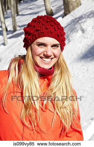 Portrait of woman wearing red knit hat and coat View Large Photo Image Stock Photography - Portrait of woman wearing red knit hat and coat. Fotosearch
