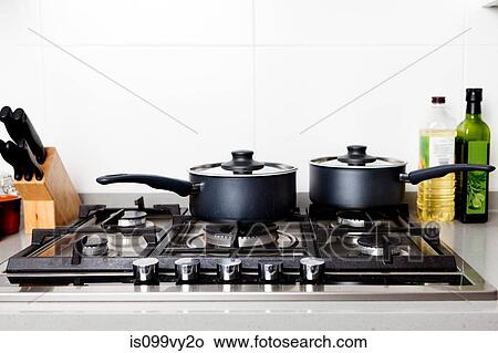 Saucepans on gas hob View Large Photo Image Picture - Saucepans on gas hob. Fotosearch