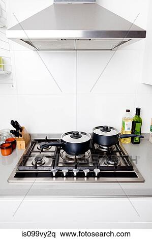 Saucepans on gas hob View Large Photo Image Stock Photography - Saucepans on gas hob. Fotosearch