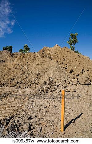 Stock Photo - Surveyors marker in construction site. Fotosearch