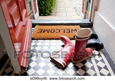 Welcome mat and wellington boots View Large Photo Image Stock Image - Welcome mat and wellington boots. Fotosearch