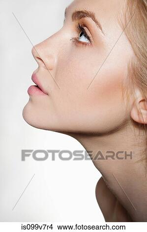 Woman looking up View Large Photo Image Picture - Woman looking up. Fotosearch
