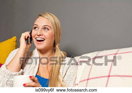 Woman on cell phone View Large Photo Image Stock Image - Woman on cell phone. Fotosearch