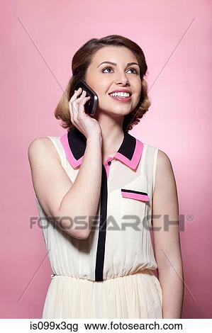 Woman on smartphone View Large Photo Image Stock Image - Woman on smartphone. Fotosearch