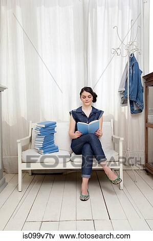 Stock Photo - Woman reading book. Fotosearch
