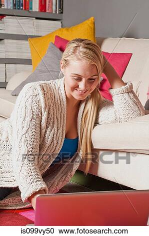 Stock Image - Woman using laptop. Fotosearch