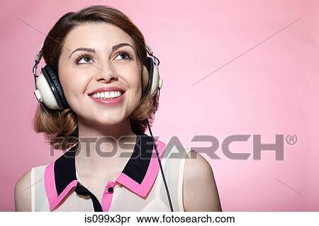 Woman wearing headphones View Large Photo Image Stock Photography - Woman wearing headphones. Fotosearch