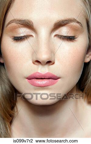 Woman with eyes closed View Large Photo Image Stock Image - Woman with eyes closed. Fotosearch